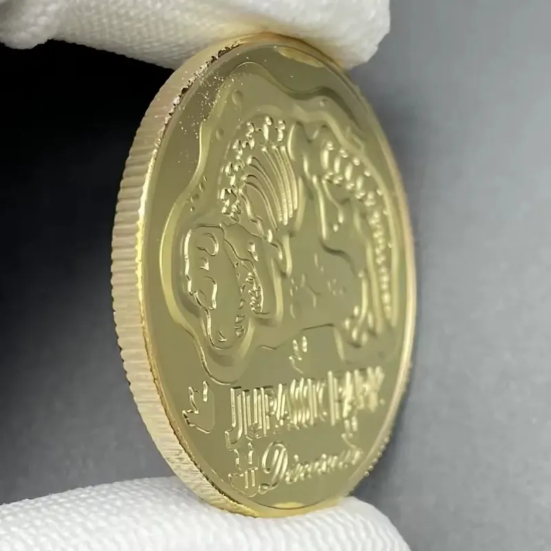 Limitovaná zberateľská pamätná minca pre fanúšikov Jurského parku